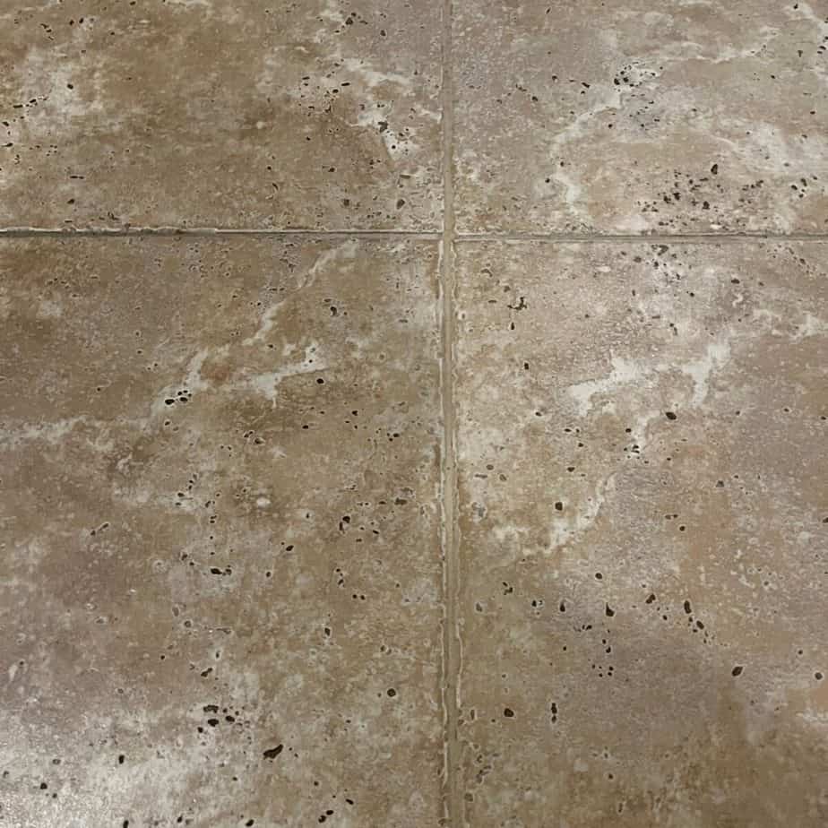 Picture of tile after cleaning grout with a steam cleaner. 