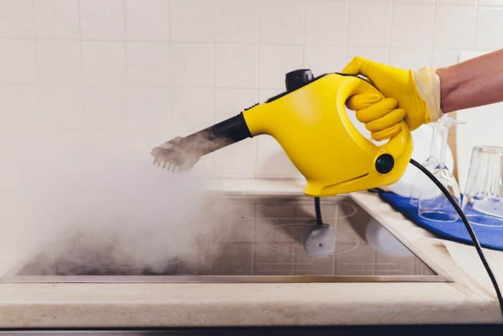 Picture of a steam cleaner being used to get rid of bacteria.