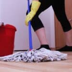 Picture of a person cleaning floors