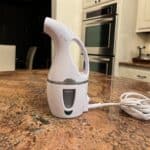 Picture of a handheld steam cleaner.